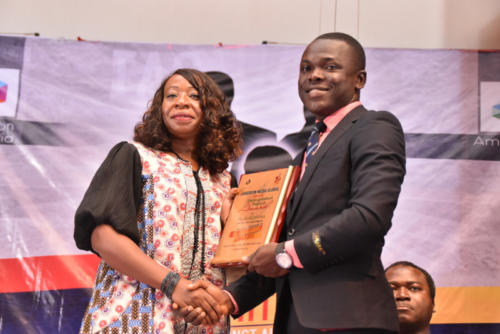 Mrs Doris Akpovwa eceives her award at TAS.2.0
