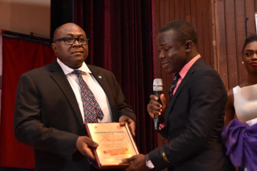 Receiving award on behalf of WEMA Bank Group MD.
